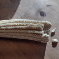 gourd seed white corn on wooden table (tooth corn)