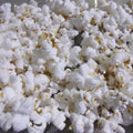 Close-up of popcorn on a grey background